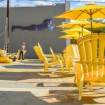 8. RE-IMAGINE SURFACE PARKING - It is difficult to understate the devastating affect that surface parking has on the vibrancy and walkability of a given neighbourhood. This parking lot – formerly used by a bank in Long Beach – has since been retrofitted with some yellow paint, a bicycle corral, two kickball stands, several chairs and umbrellas, and a wonderful mural of Jim Morrison.