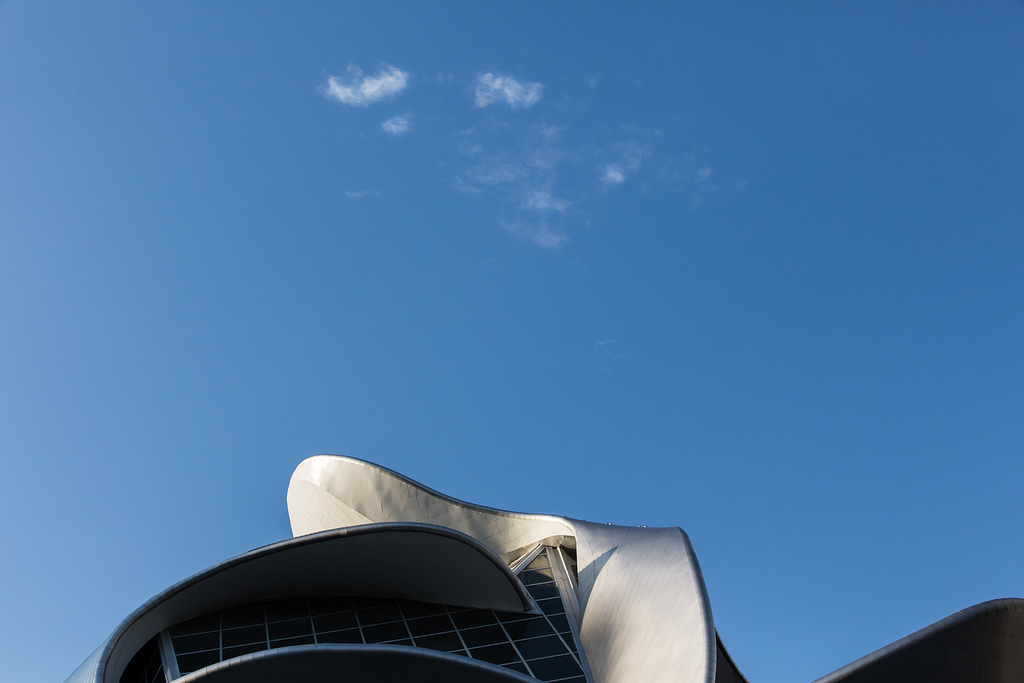 Clouds seem to form above the curving metal roof of the Art Gallery of Alberta in downtown Edmonton. © Tom Young 2012