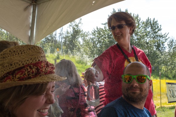 Beer garden misting volunteers keep festival-goers cool.