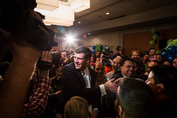 Making his way through an excited crowd.