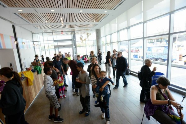 People gather inside at the Artscape Lounge at Daniels Spectrum. Image by Garrison McArthur Photographers.