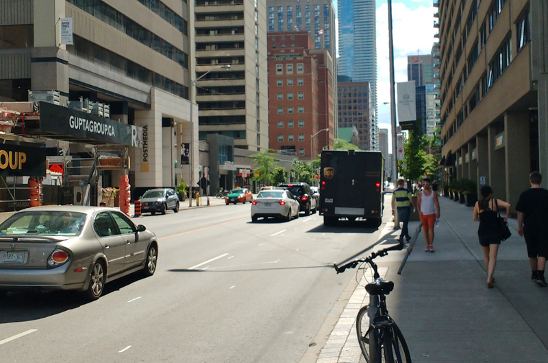 UPS truck blocking the rush hour lane on Bloor East