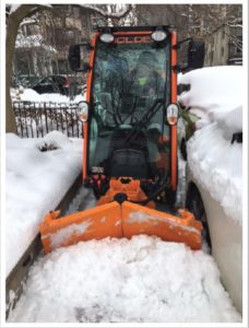 New sidewalk snow plow in action