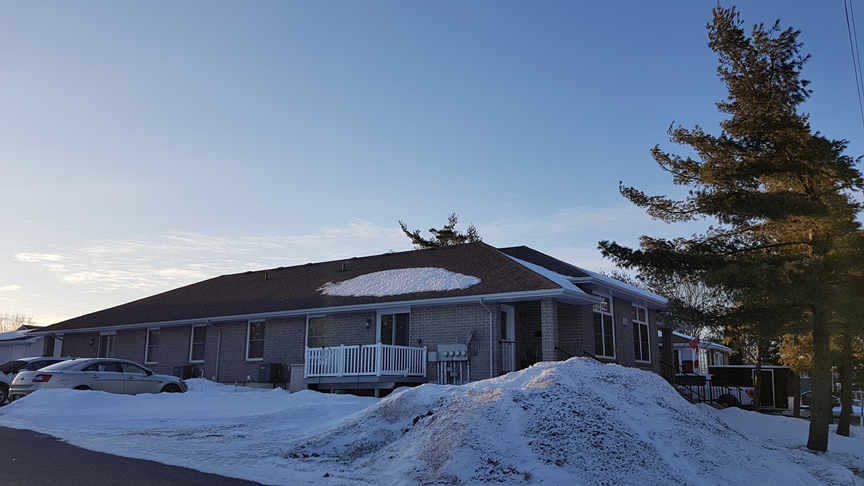 A single-storey fourplex divided like a plus sign. A form of housing that is unlikely to be replicated in areas with higher land costs, but that does provide accessible housing and low construction costs.