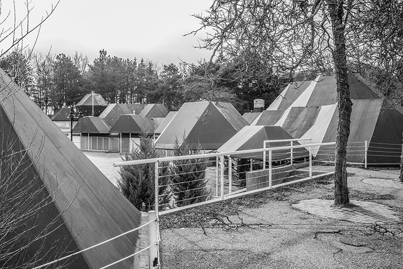 Roofs of the dilapidated modular buildings that housed shops and restaurants.