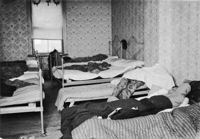 Slum interior, crowded beds