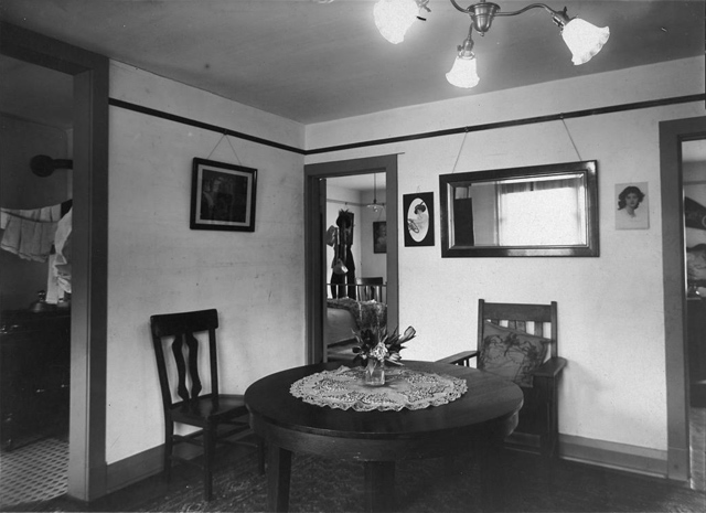 Dining room in Toronto Housing Company's Spruce Court, between 1913 and 1915. 