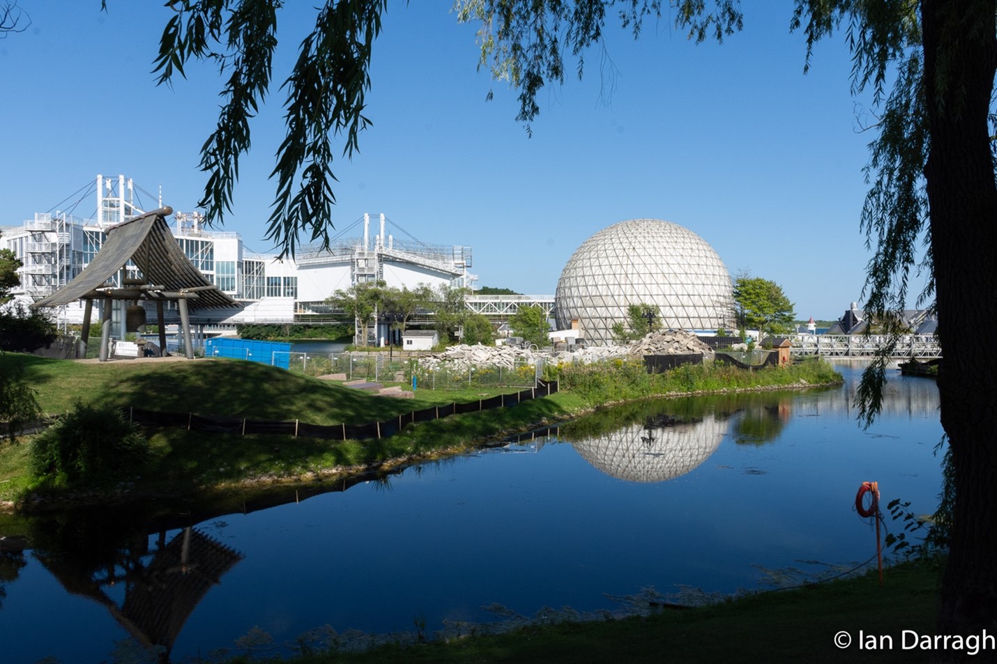 Construction fences and rubble surround the iconic Cinesphere and Gohn Ohn Bell (which commemorates the centennial of Japanese settlement in Canada) as work has already started on the redevelopment of Ontario Place’s West Island.