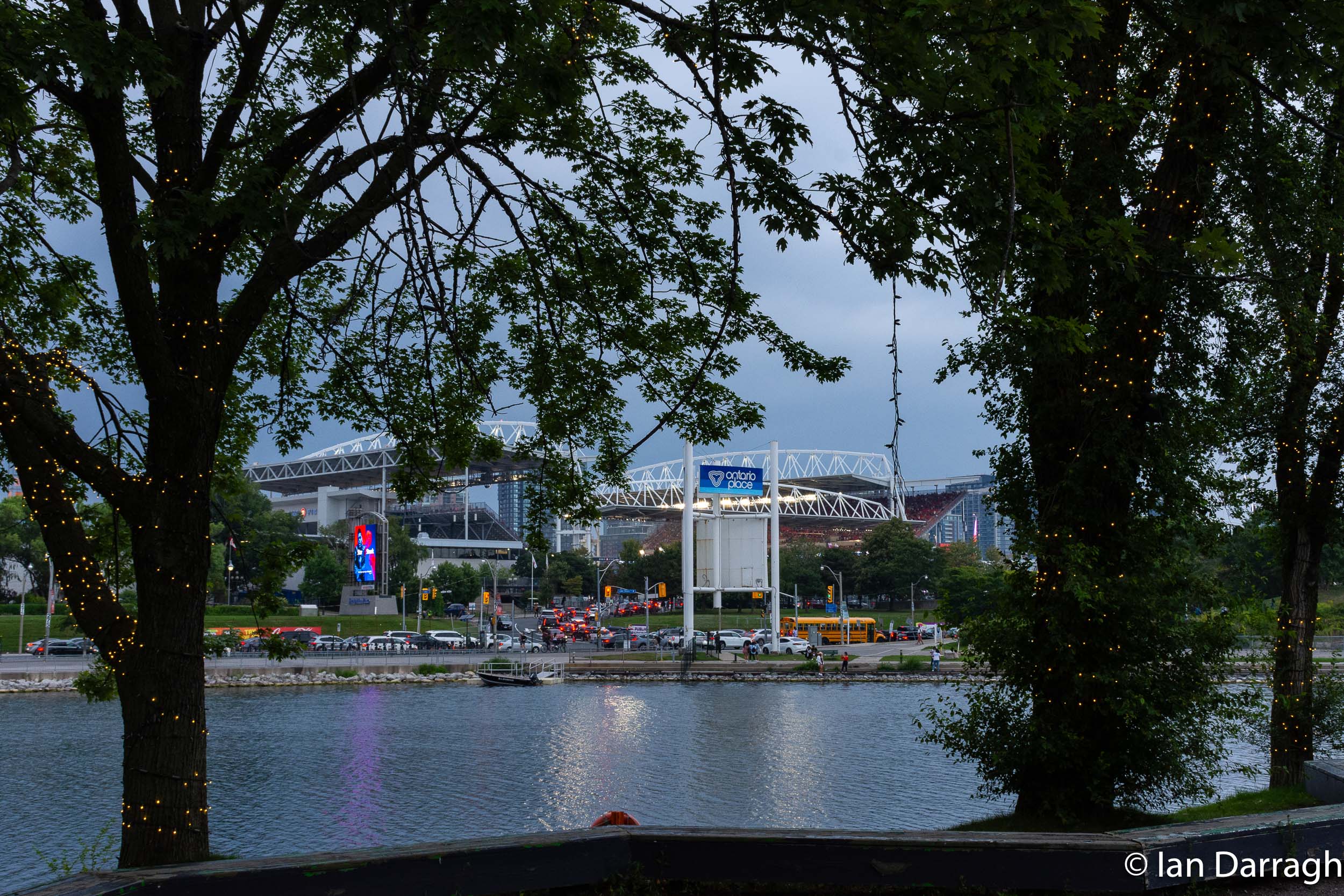 Some of the old touches of Ontario Place remain, like these lights wrapped around mature trees that border a waterfront trail. The proposal is to clearcut all the trees on the West Island.