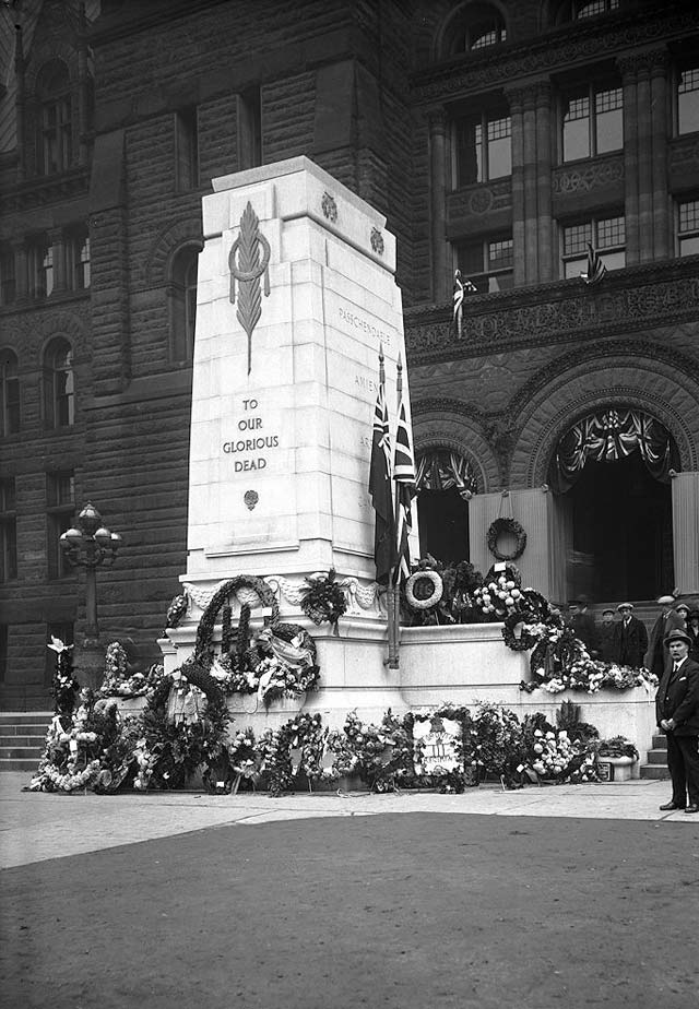 Cenotaph, City Hall, decorated with wreaths, Remembrance Day, view from southeast , November 11, 1925. City of Toronto Archives, Fonds 200, Series 372, Subseries 41, Item 549.