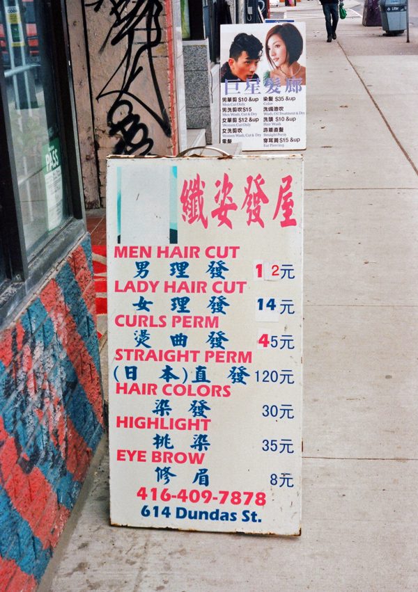 Sandwich board, Lotus Hair Salon, 614 Dundas Street West, 2020