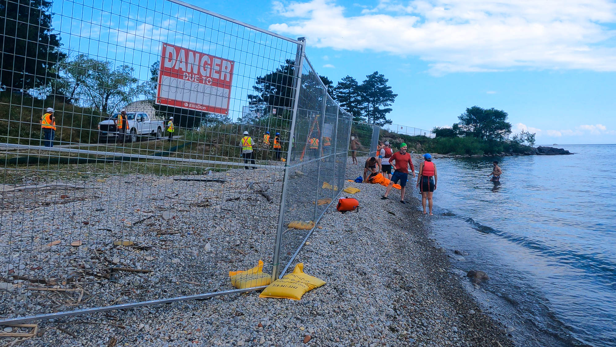 A fence on Michael Hough Beach has prevented swimmers from using the beach all summer. Security guards at Ontario Place often call police to arrest swimmers, but so far they have not laid charges. (It is unknown what the offence would be?) When there are high waves, the fence is a hazard to boaters if they capsize and need to come ashore in an emergency, according to Steve Mann of SwimOP.  (Photo: Steve Mann)