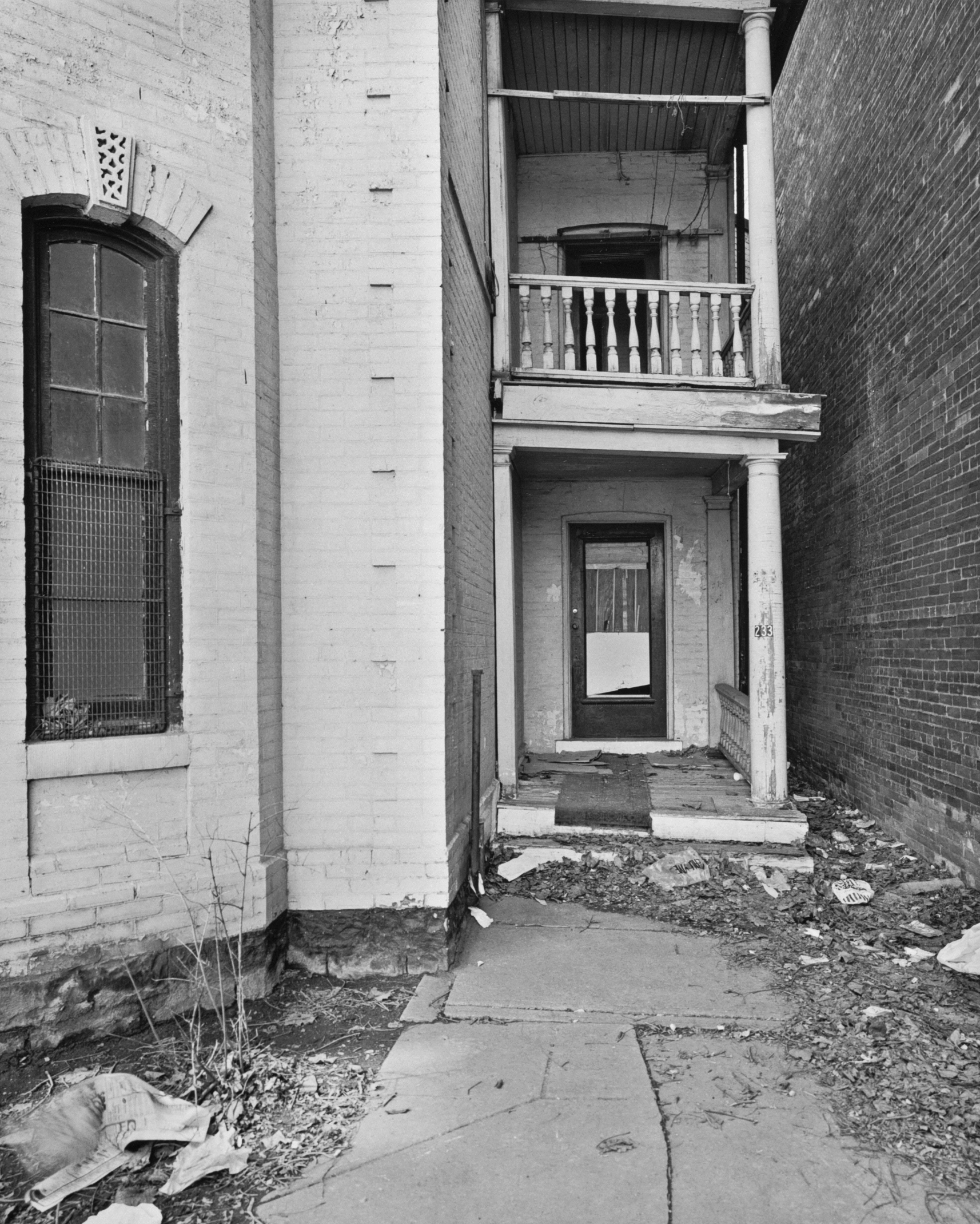 Vacant House, Side Entrance Identified as 233 Spadina, 1984.