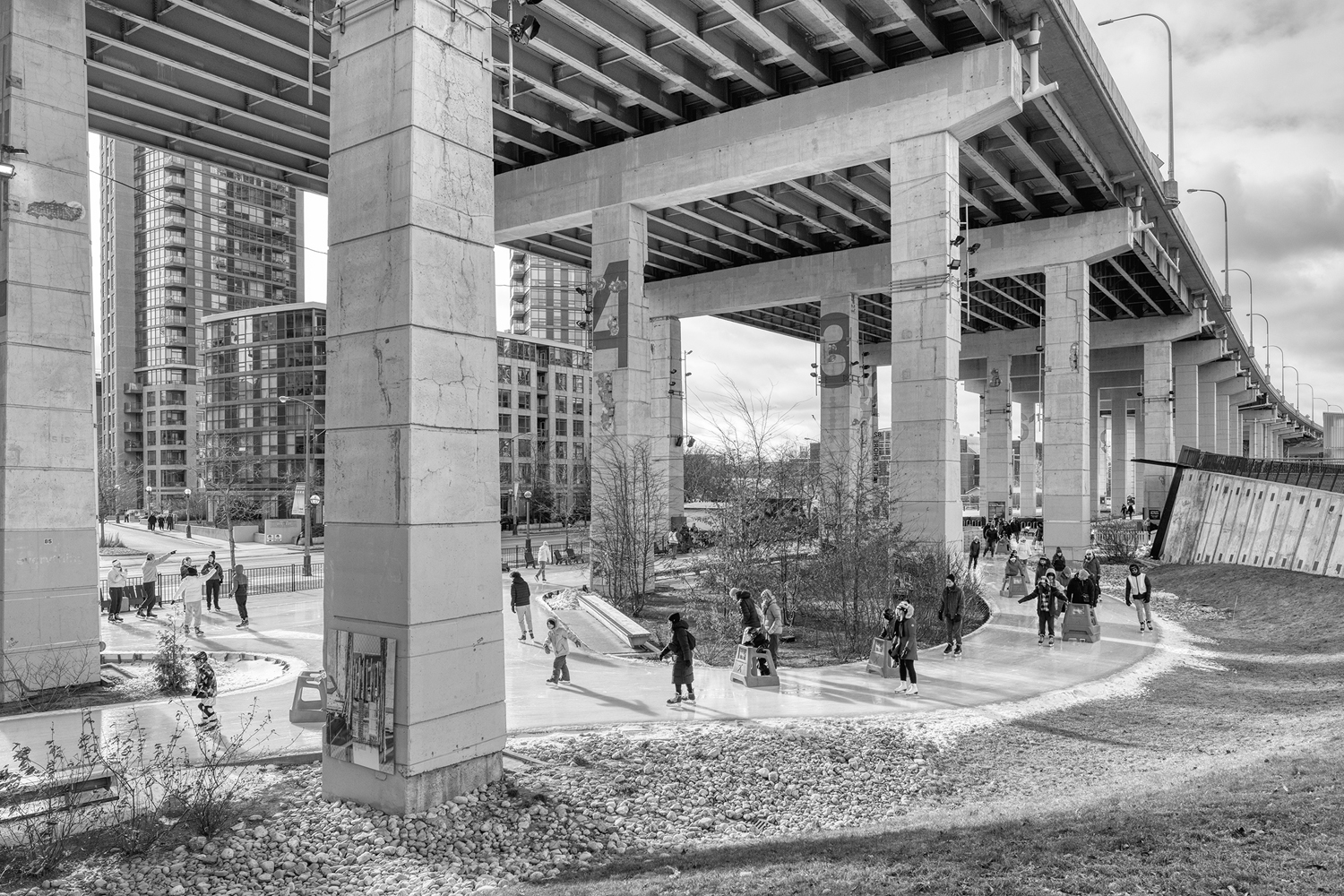 The Bentway Skate Trail, located below the Gardiner Expressway, is part of an ongoing innovative project that utilizes formally abandoned industrial land for public use.