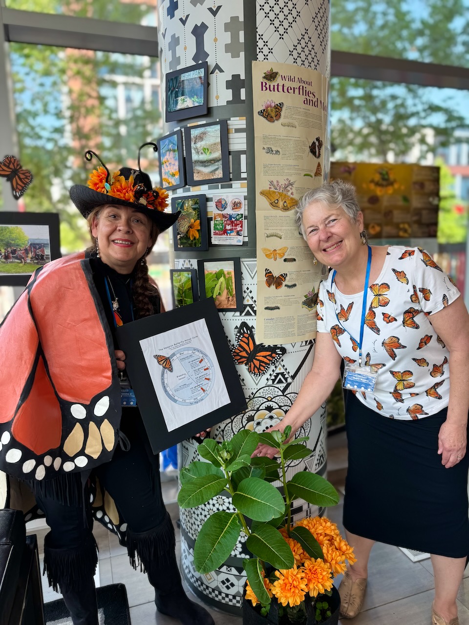 Lumy Fuentes Castillo (L) and Robin Buyers of the Indigenous People's Solidarity Group plant milkweed in Toronto’s parks because the endangered monarch butterfly will only lay its eggs on the plant, which is commonly eradicated as a weed.