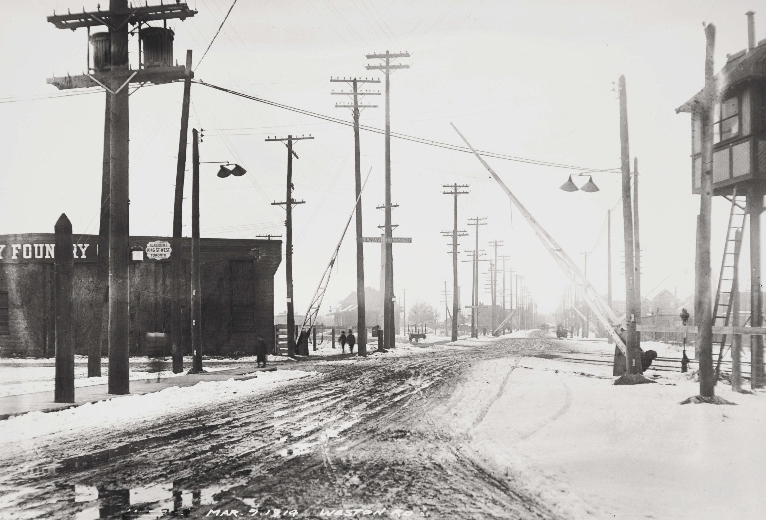 Arthur Goss: Rail Crossing, Weston Road at Junction Road, March 9, 1914A corner of the Gurney Foundry is seen on the left