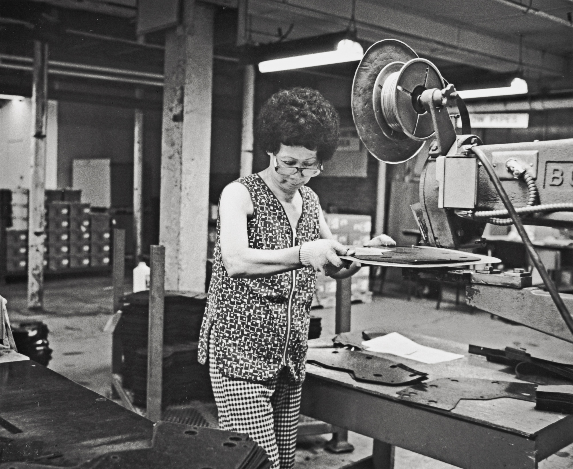 Susi Chow operating a stitcher, Department 53, August, 1993