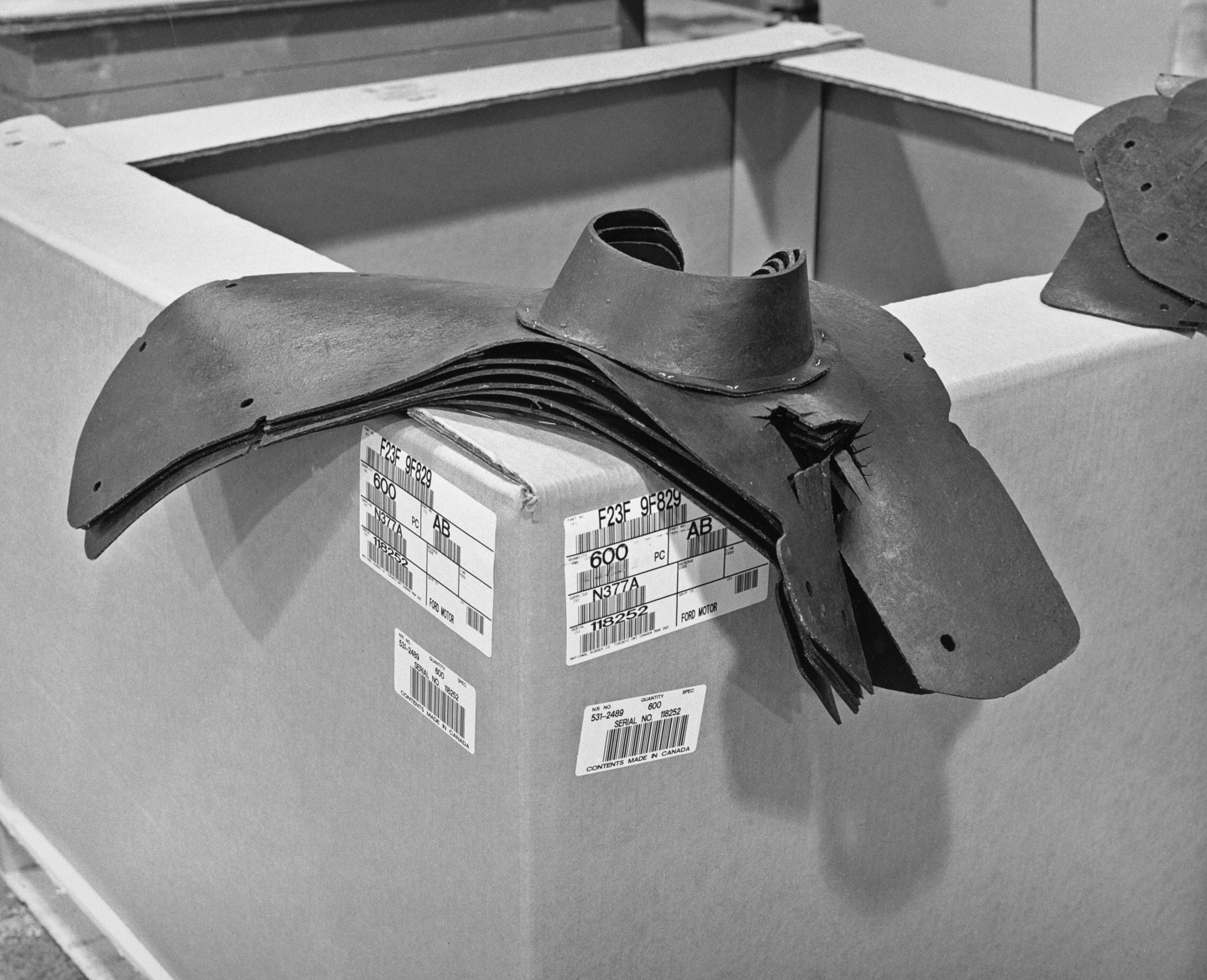 Air baffles for Ford made from recycled rubber, December, 1993
