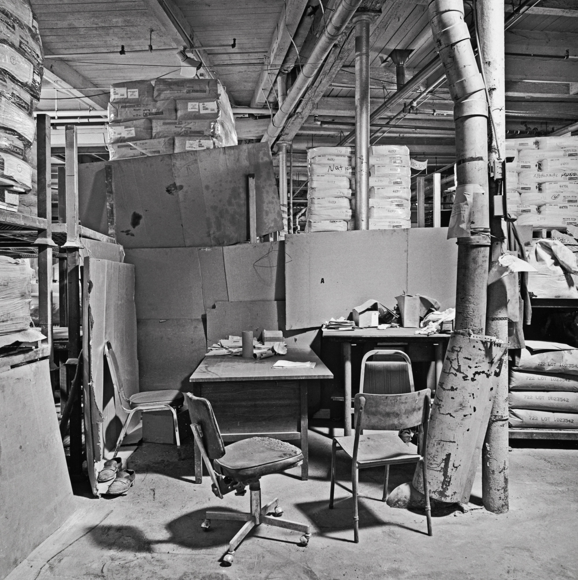 Rapinder Bains' improvised office in the chemical mixing area, June, 1994