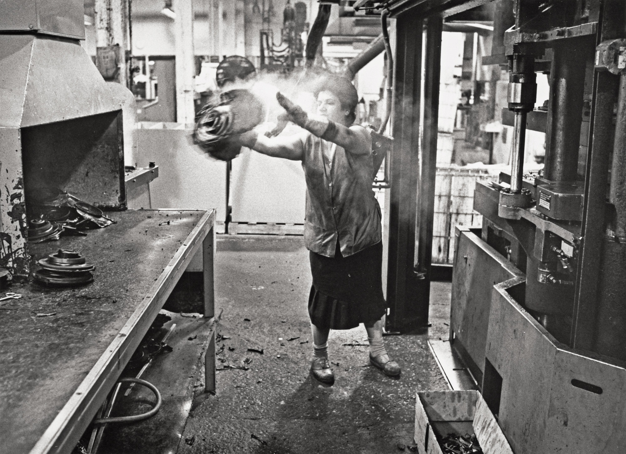 Maria Platti unloading an injection moulding press, Department 56, May, 1993