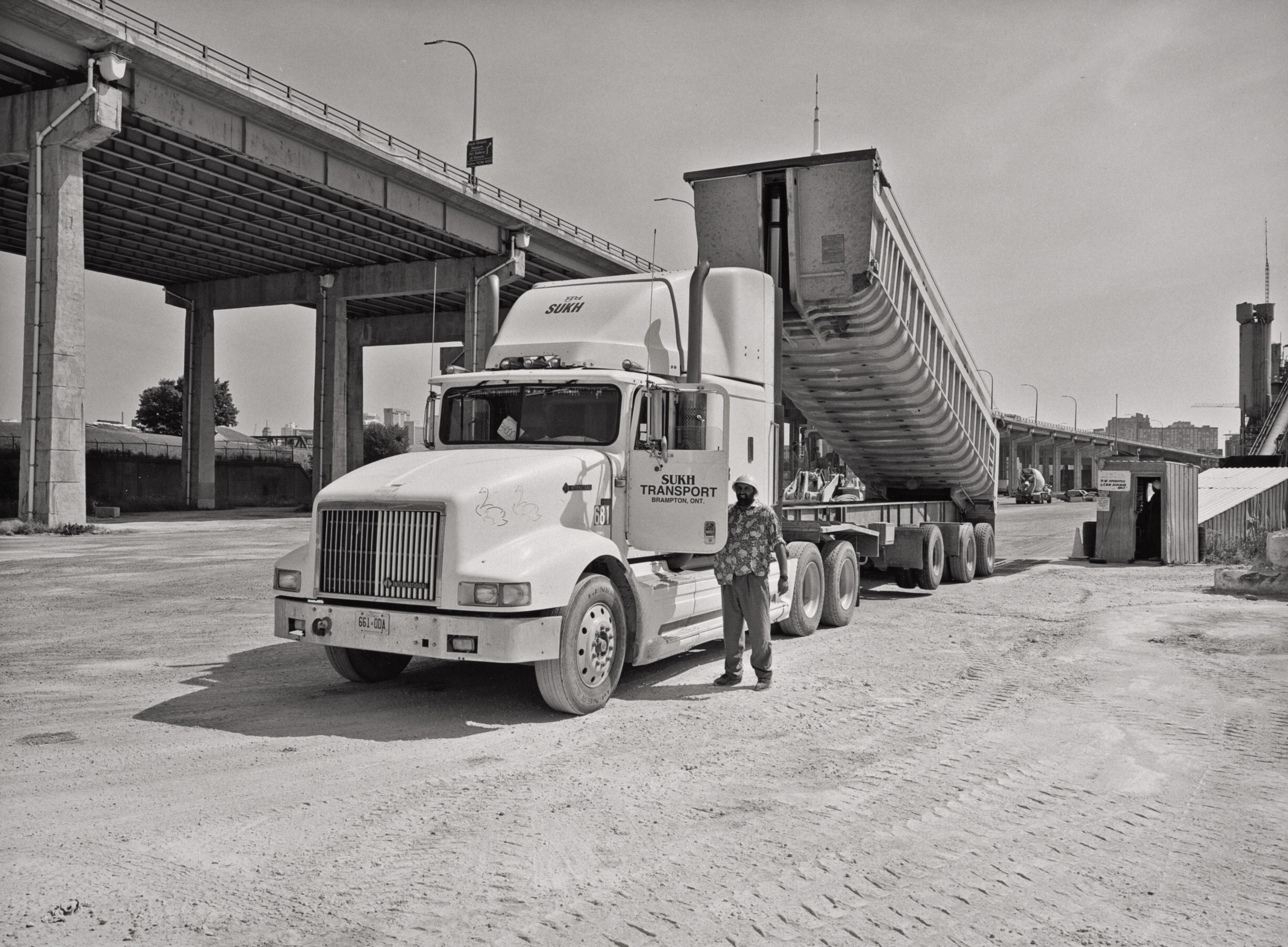 Aggregate truck and driver, CBM ready mix plant, Bathurst Street, 1998.