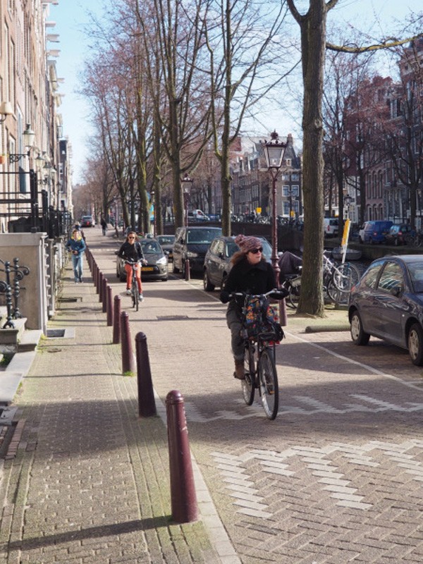 A shared street slows down traffic, but mixes cycling and driving.