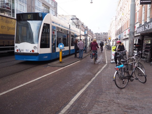 A floating tram stop allows cycling and transit to coexist efficiently.