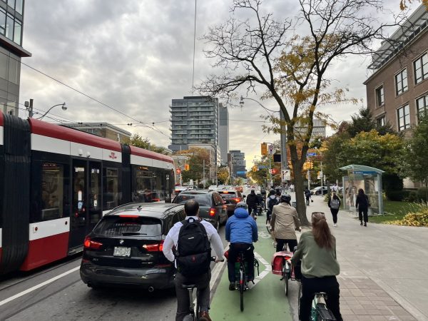 Cyclists in bike lane.