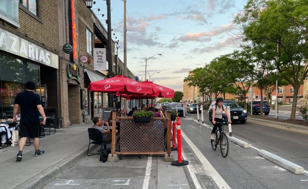 Cyclist in bike lane on Bloor Street