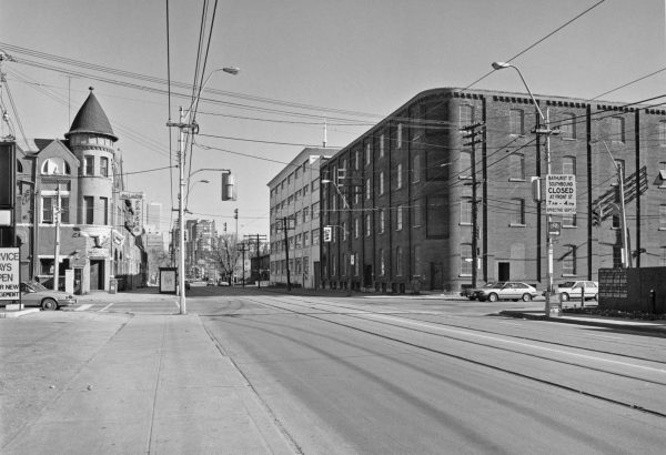 Looking east on King toward Strachan Avenue, Palace Tavern on left, Massey Ferguson Buildings 8 and 7 on right, 1986