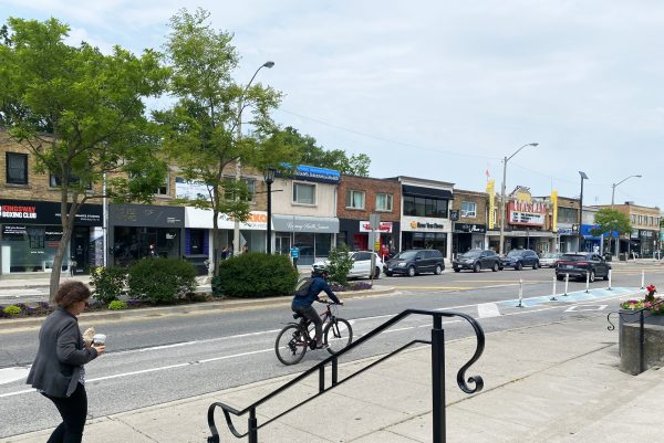 Cyclist in bike lane on Bloor Street West