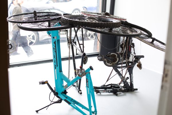 Art installation in the shape of a table made of bike parts