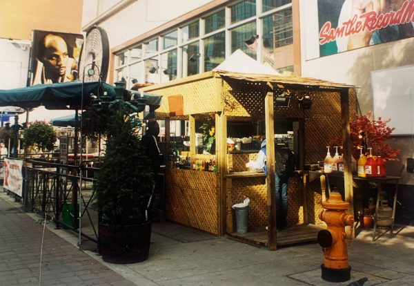 Food stand in front of Sam the Record Man