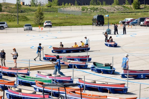 Wheeled canoes on tarmac