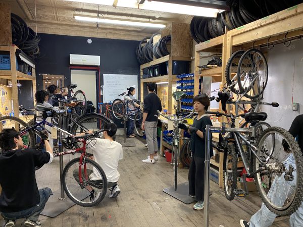 Bike mechanics working
