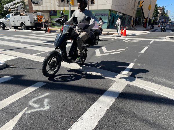 Person riding e-bike