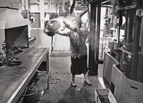 Maria Platti unloading an injection moulding press, Department 56, May, 1993
