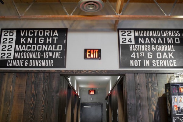 Vintage bus signs at Colony Bar